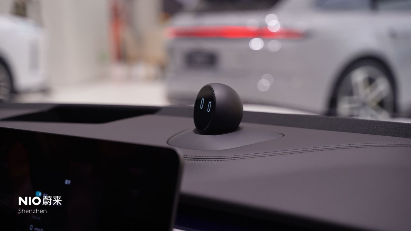 A round black object on a black surfaceAI-generated content may be incorrect.