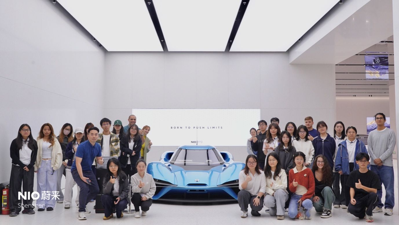 A group of people posing for a photoAI-generated content may be incorrect.